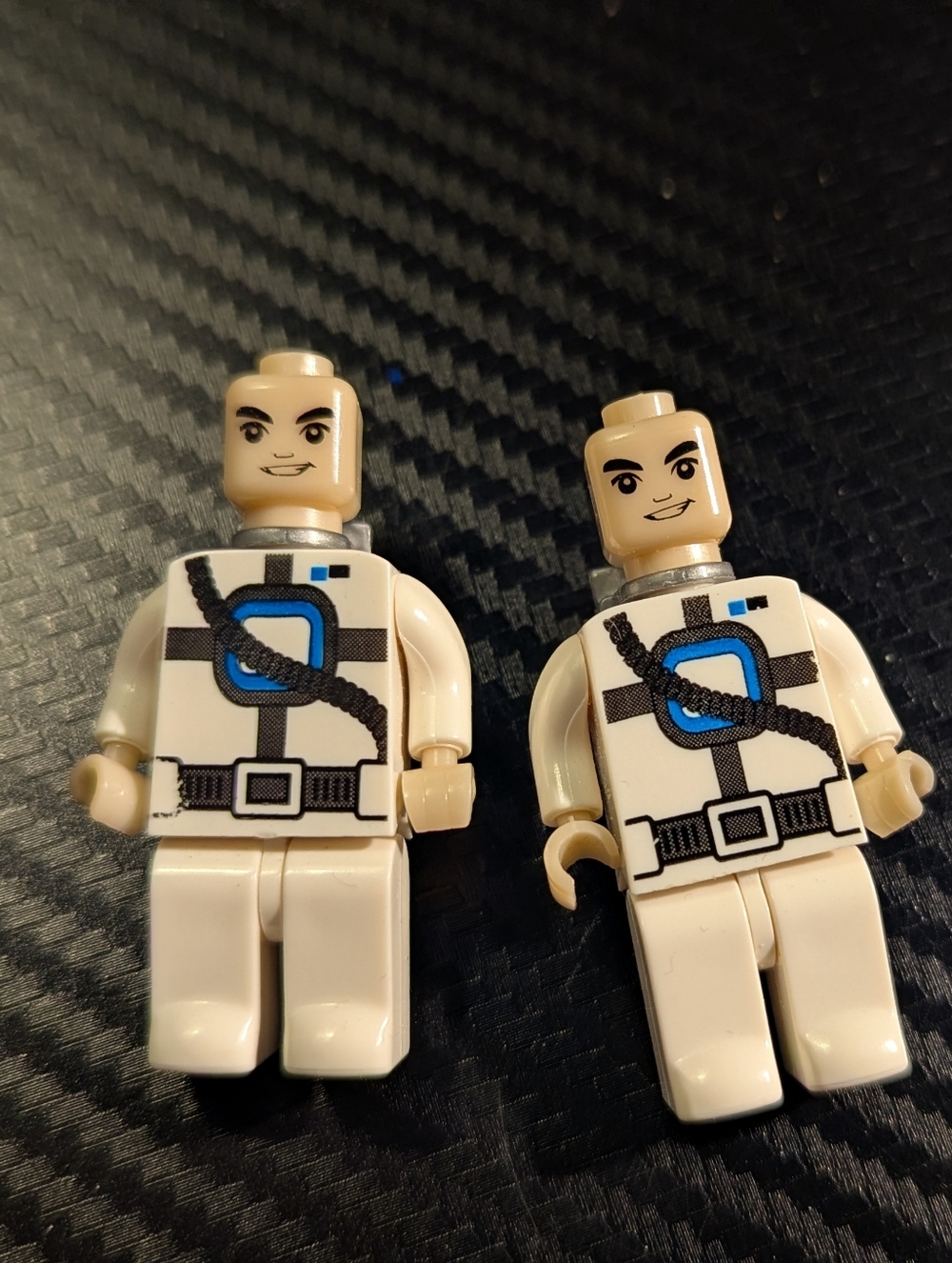 White Astronaut Minifigure Duo with Blue Emblem